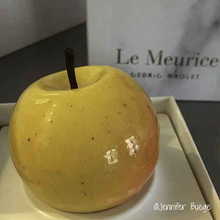 A pastry styled to look like an apple